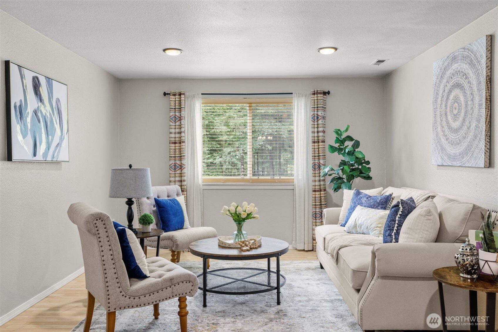 19221 Patterson Road East Orting, WA 98360 - Photo 6 of 40 a living room with furniture and a large window