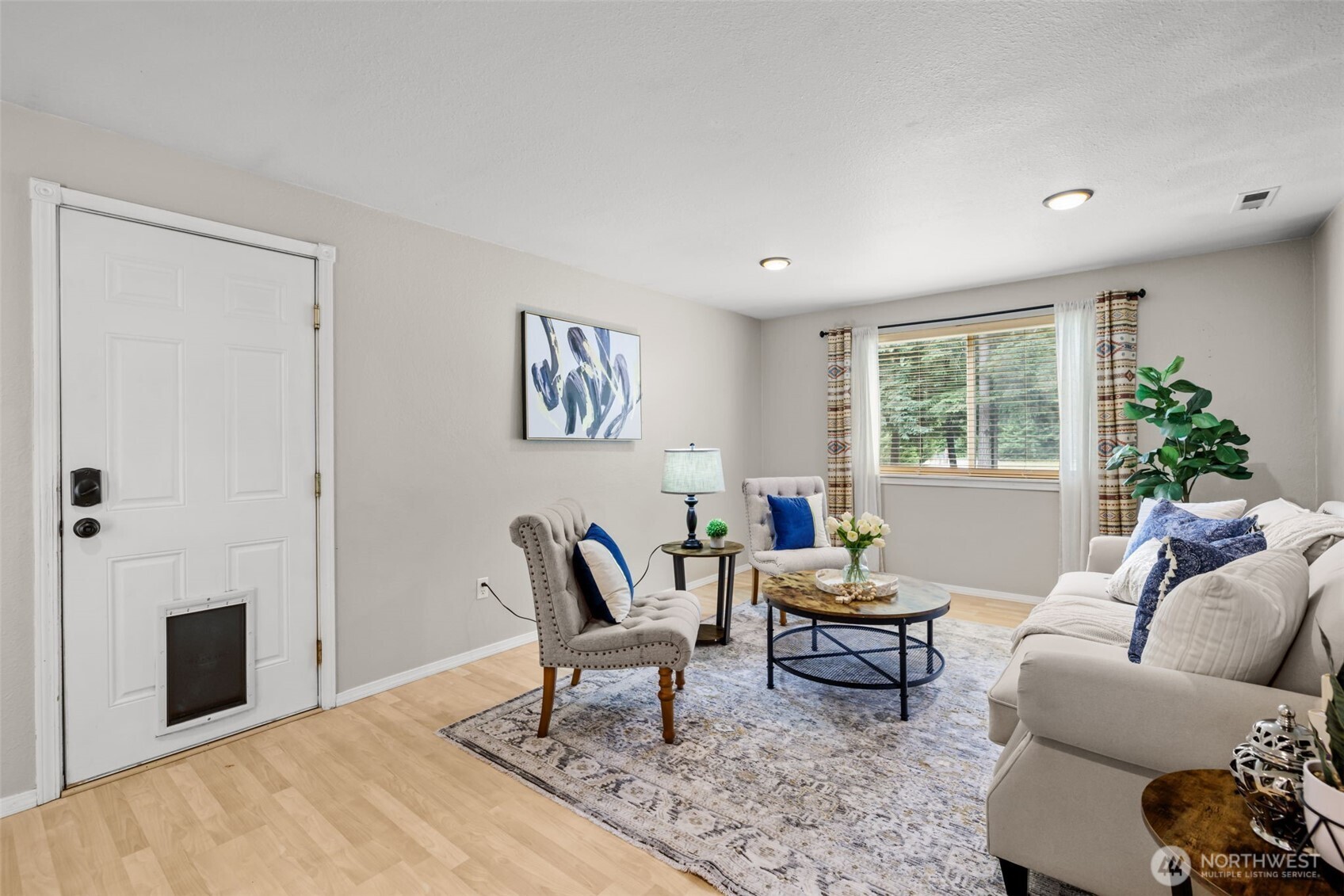 19221 Patterson Road East Orting, WA 98360 - Photo 8 of 40 a living room with furniture and a window