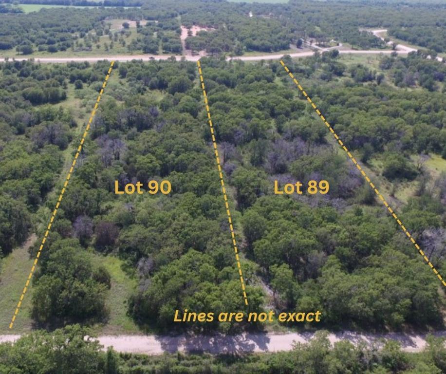 Lot 90 Paradise Oaks Perrin, TX 76486 - Photo 15 of 15 a sign that is sitting on a brick wall