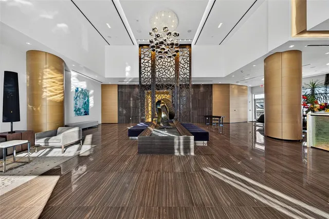 a view of a living room and dining room