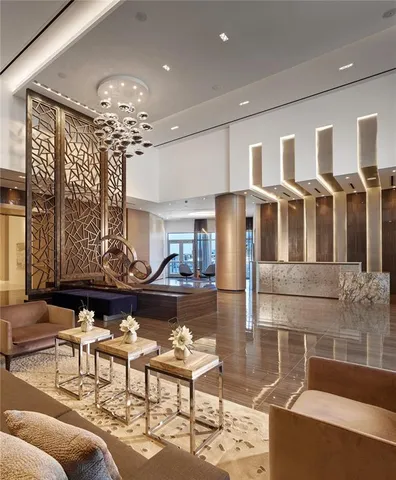 a view of a swimming pool with a table and chairs