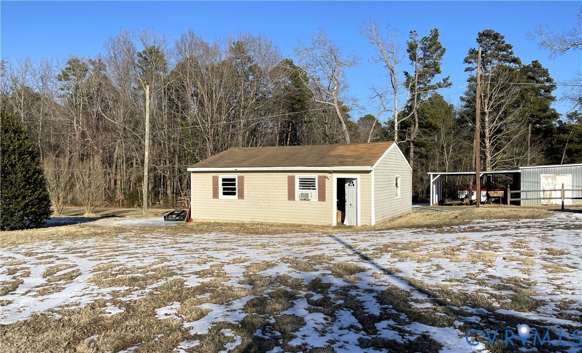 1825 Needham Drive Victoria, VA 23974 - Photo 25 of 32 a view of a house with a yard covered in snow