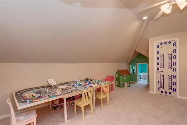 a dining room with furniture and a table