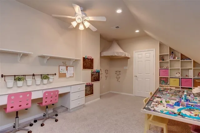 a kitchen with stainless steel appliances cabinets and a window