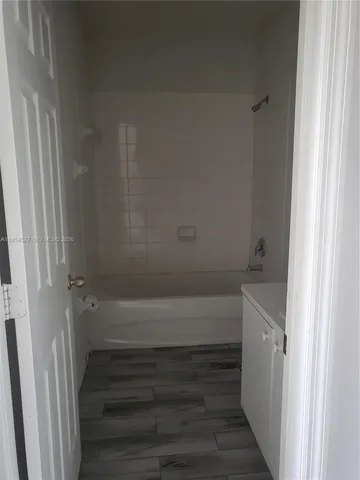 a bathroom with a bathtub
