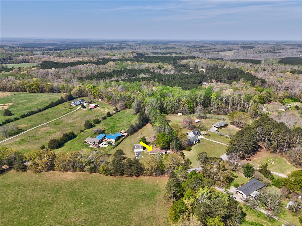 220 Bill Kay Road Belton, SC 29627 - Photo 23 of 30 This elevated view captures the tranquil rural landscape, featuring sprawling fields and lush woodlands.