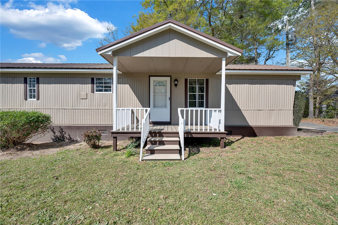 220 Bill Kay Road Belton, SC 29627 - Photo 27 of 30 This charming home offers a welcoming facade with a covered porch and traditional architectural details.