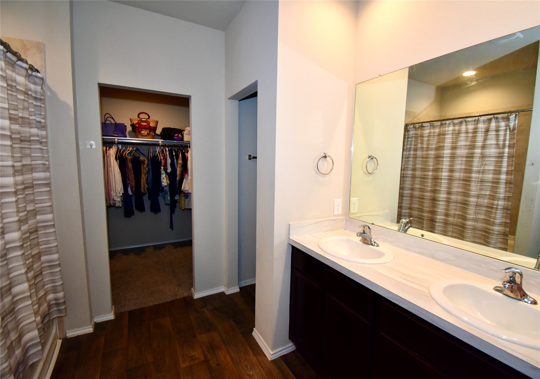 22830 Zephyr Vly Trail Spring, TX 77373 - Photo 11 of 17 a bathroom with a sink and a mirror