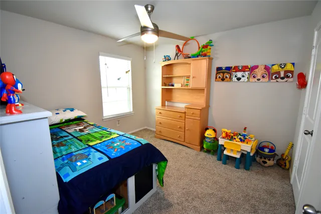 a kids room with toys and toys