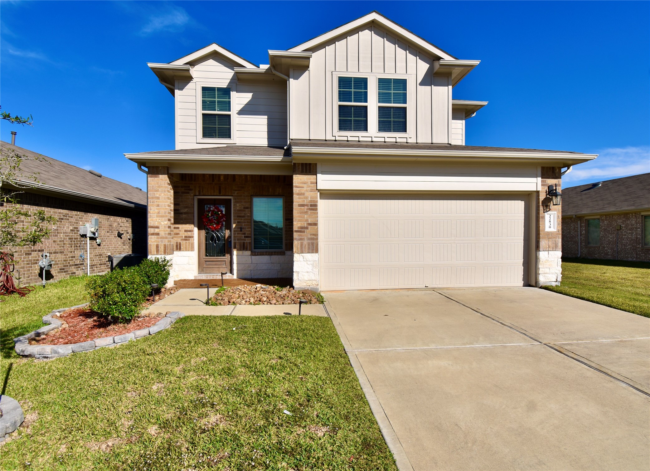 22830 Zephyr Vly Trail Spring, TX 77373 - Photo 2 of 17 a front view of a house with garden