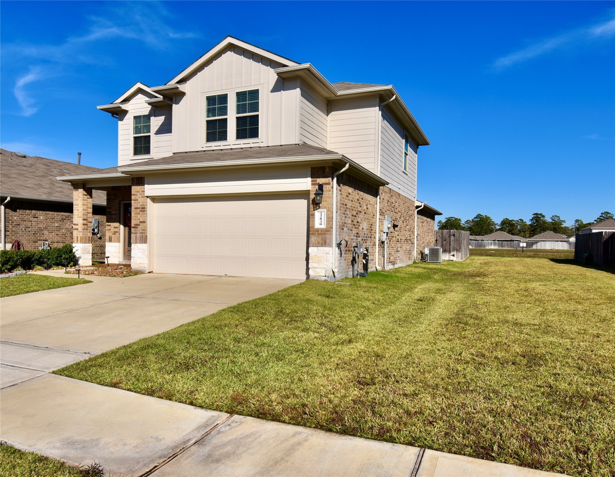 22830 Zephyr Vly Trail Spring, TX 77373 - Photo 5 of 17 a front view of a house with a yard