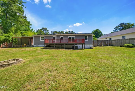 a view of a house with a big yard