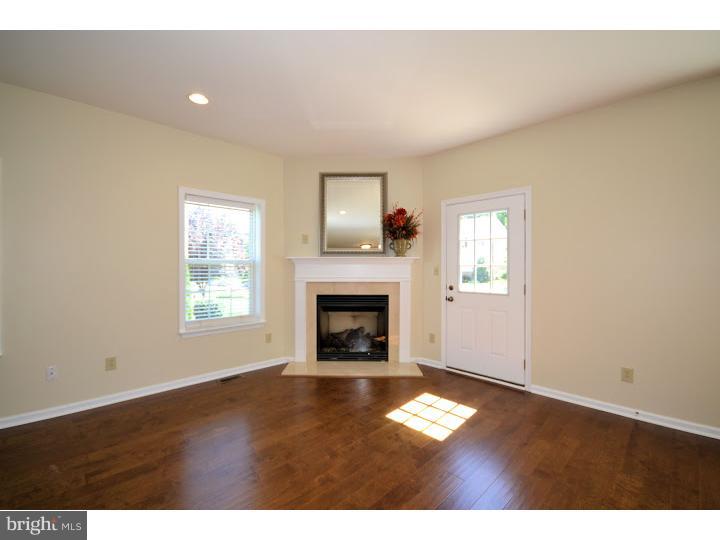 487 Buchanan Road Perkasie, PA 18944 - Photo 11 of 25 a view of an empty room with a window and fireplace