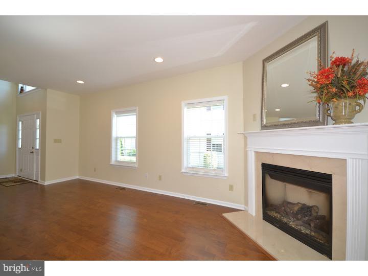 487 Buchanan Road Perkasie, PA 18944 - Photo 9 of 25 a view of an empty room with a fireplace and a window