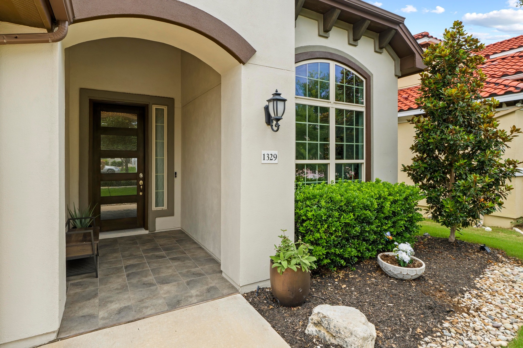 1329 Siena Sunset Road Leander, TX 78641 - Photo 6 of 33 Covered porch entrance invites you in.