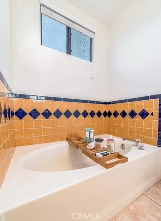 a bathroom with a sink and a bathtub