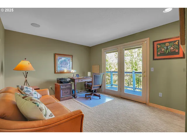 a bathroom with a sink mirror and toilet