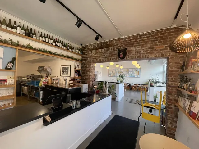 a living room with lots of furniture and a flat screen tv