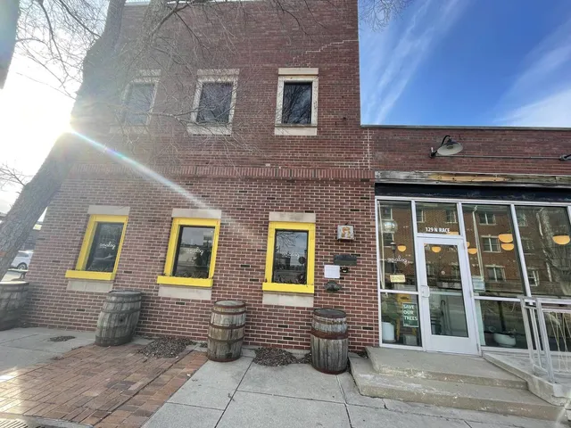 a front view of a house with glass windows