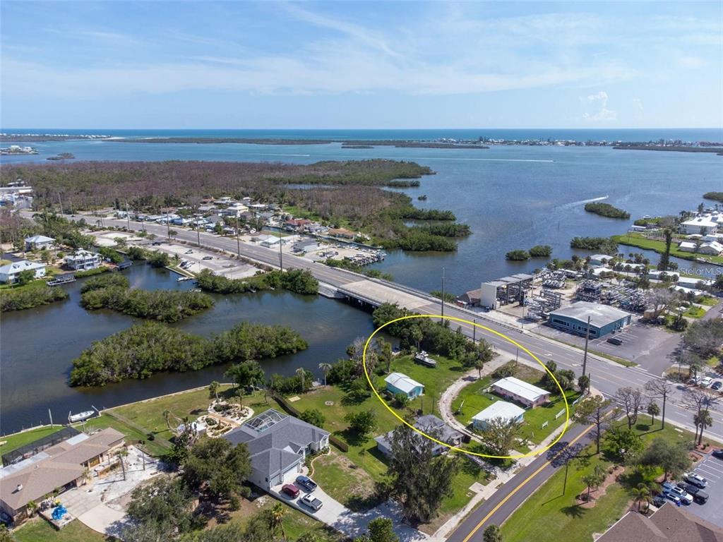 an aerial view of lake and city