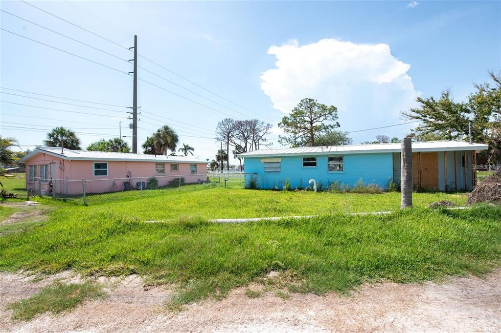 1695 Manor Road Englewood, FL 34223 - Photo 16 of 37 a view of a backyard