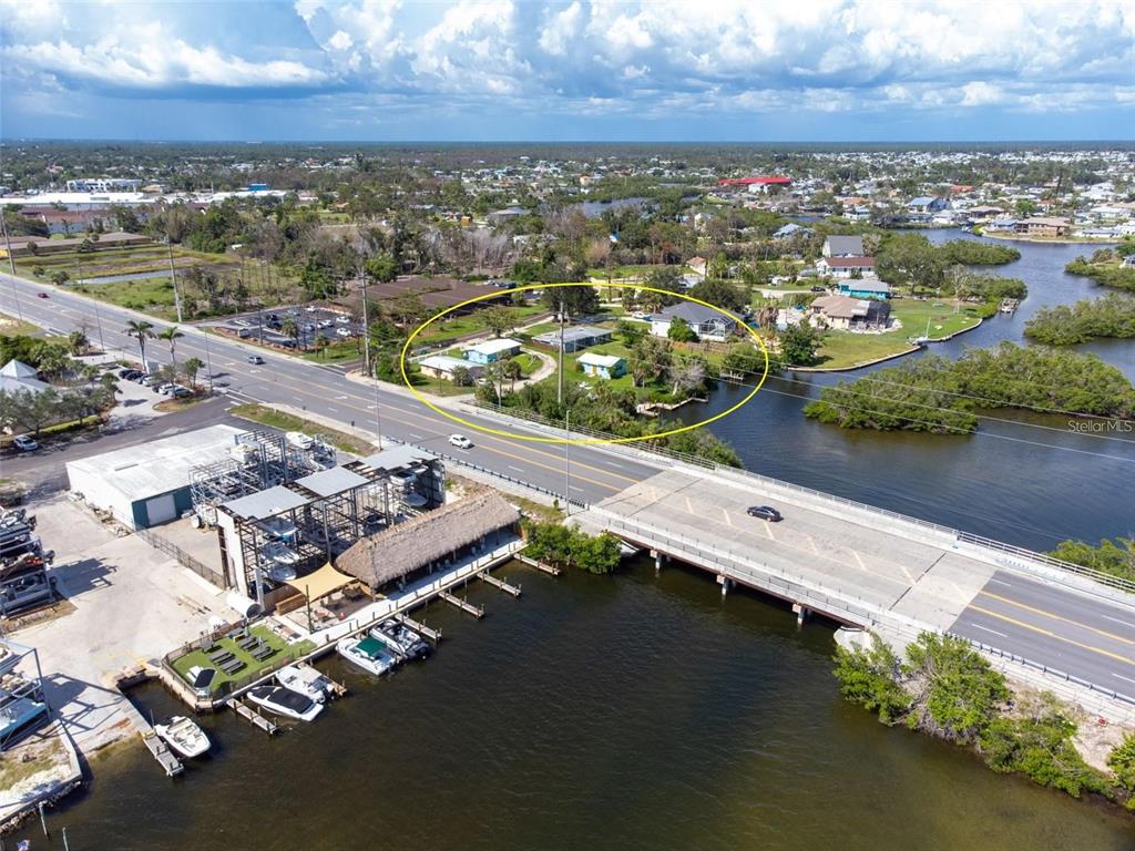 1695 Manor Road Englewood, FL 34223 - Photo 3 of 37 an aerial view of a city with ocean view