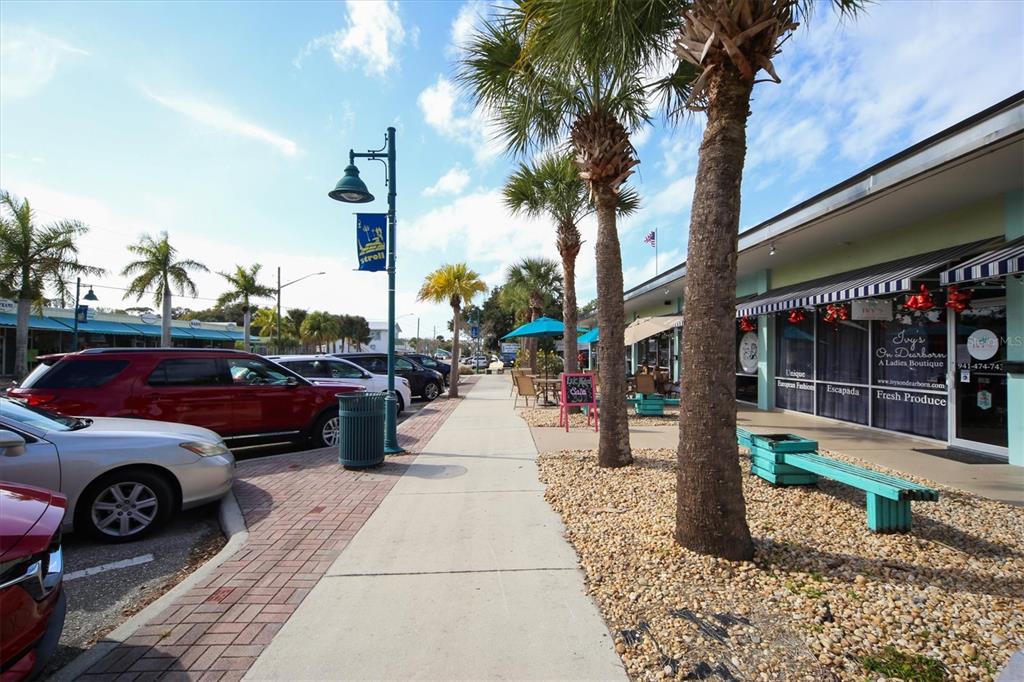 1695 Manor Road Englewood, FL 34223 - Photo 32 of 37 a view of a street with cars