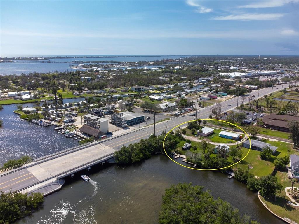1695 Manor Road Englewood, FL 34223 - Photo 8 of 37 an aerial view of residential houses with outdoor space