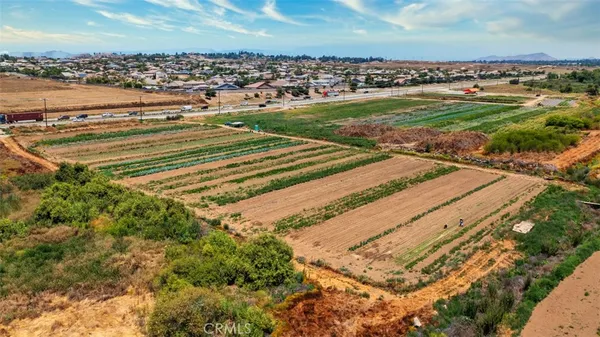 a view of a tennis ground with a large window