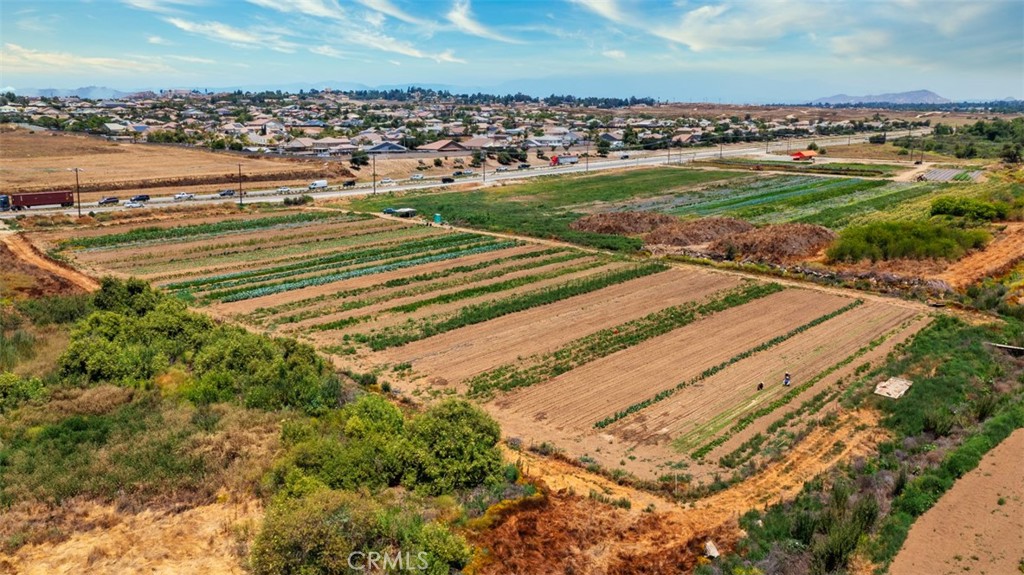 19203 Cajalco Road Perris, CA 92570 - Photo 8 of 14 an aerial view of a houses