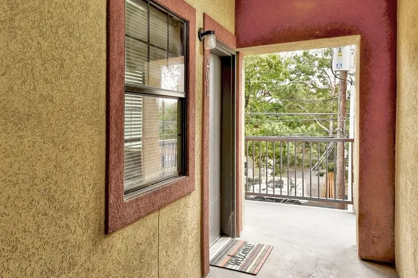 a view of a room with a large window