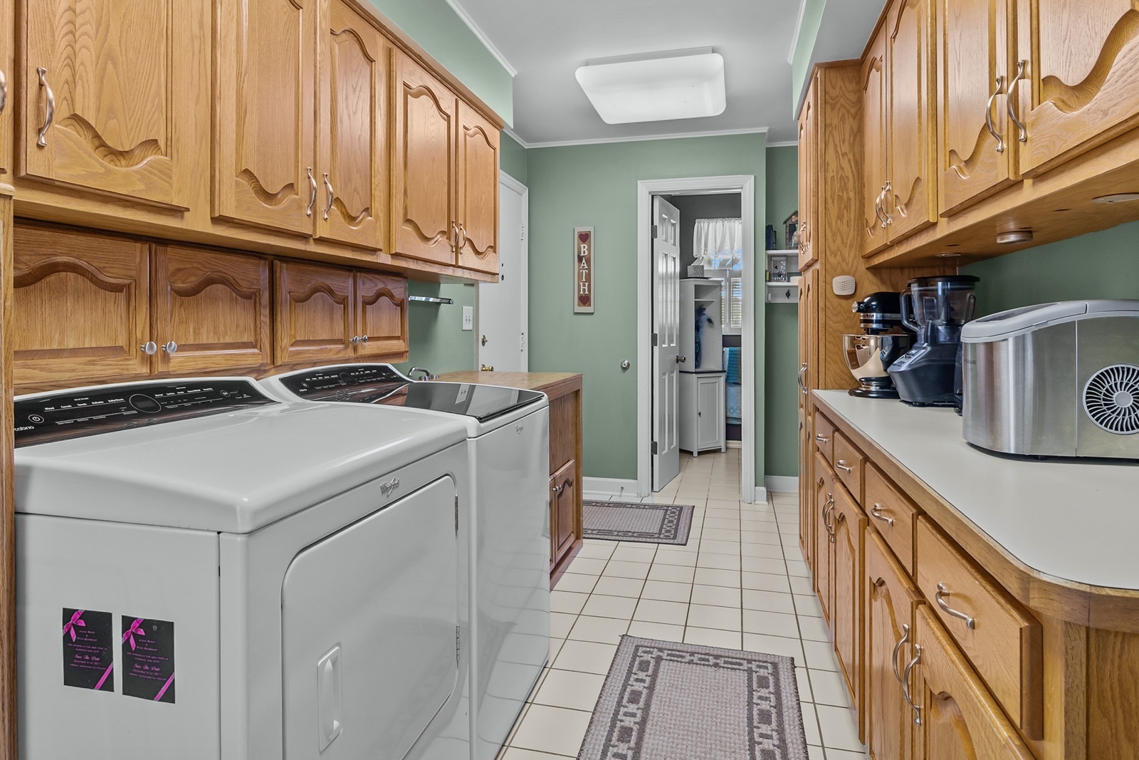 8612 Crystal Springs Road Woodstock, IL 60098 - Photo 12 of 45 a utility room with dryer and washer
