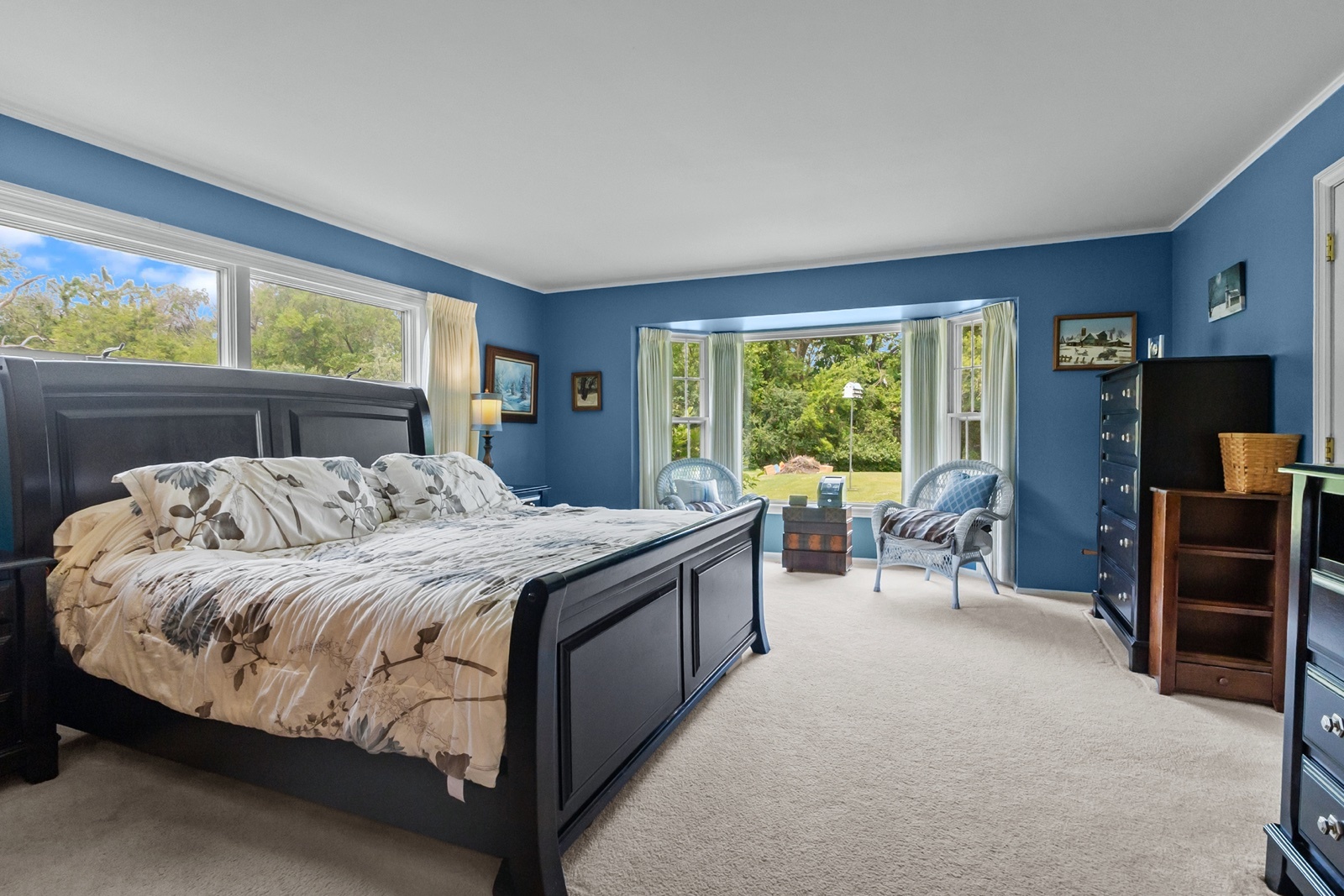 8612 Crystal Springs Road Woodstock, IL 60098 - Photo 17 of 45 a bed sitting in a bedroom next to a window