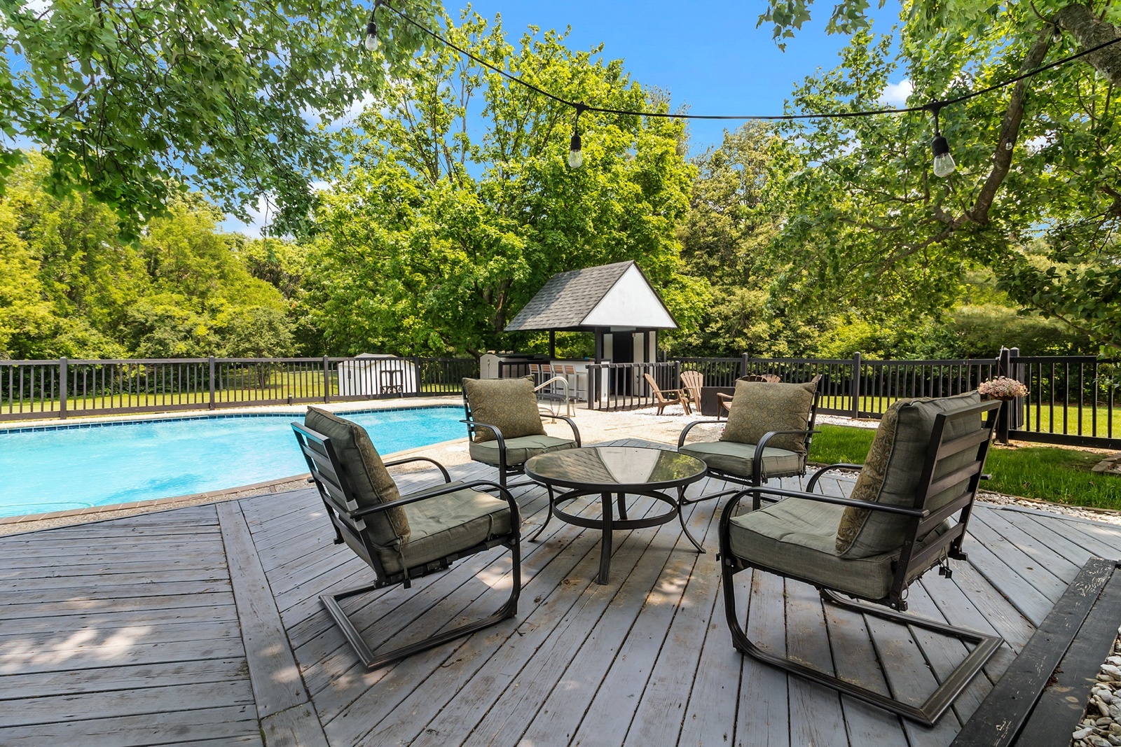 8612 Crystal Springs Road Woodstock, IL 60098 - Photo 32 of 45 a view of a patio with furniture