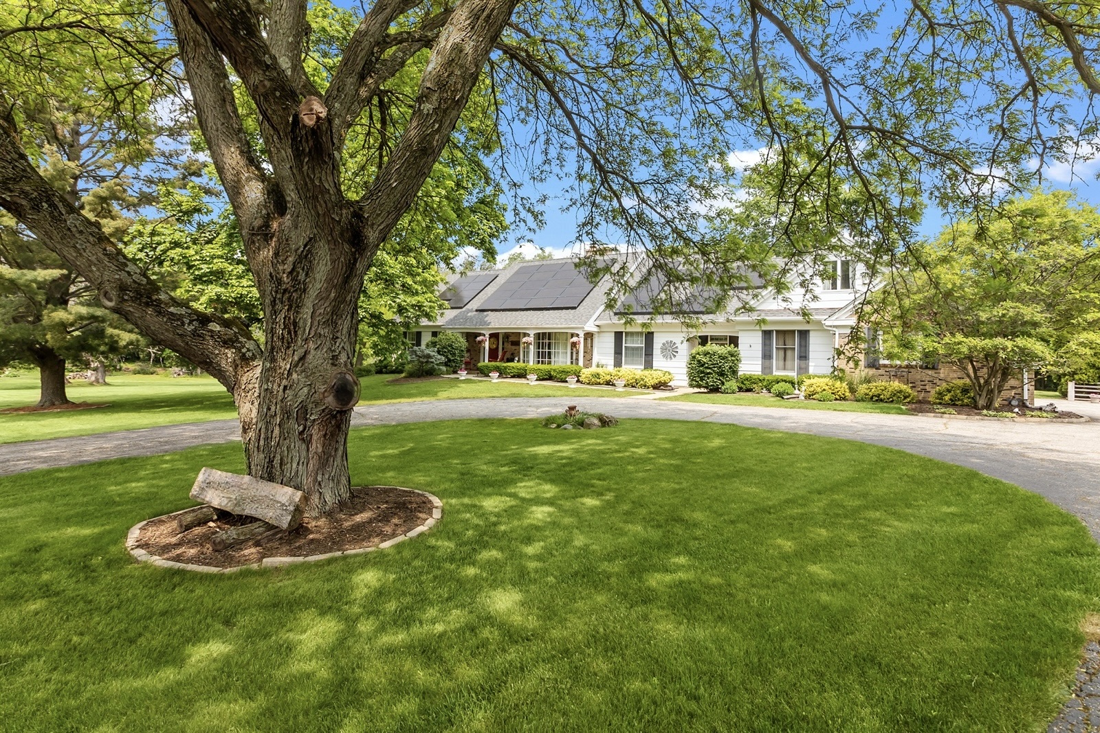 8612 Crystal Springs Road Woodstock, IL 60098 - Photo 43 of 45 a front view of a house with a yard