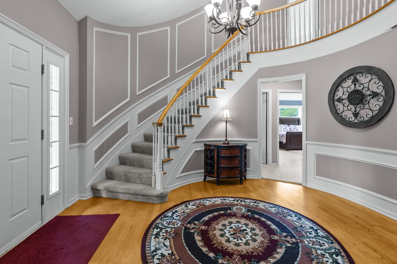 8612 Crystal Springs Road Woodstock, IL 60098 - Photo 5 of 45 a view of entryway with a rug and a rug