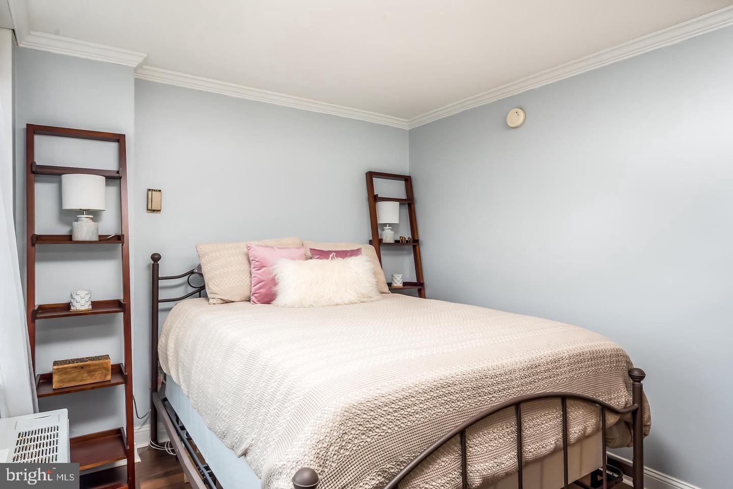 2800 Wisconsin Avenue Northwest, Unit 510 Washington, DC 20007 - Photo 14 of 20 a bedroom with a bed and dresser