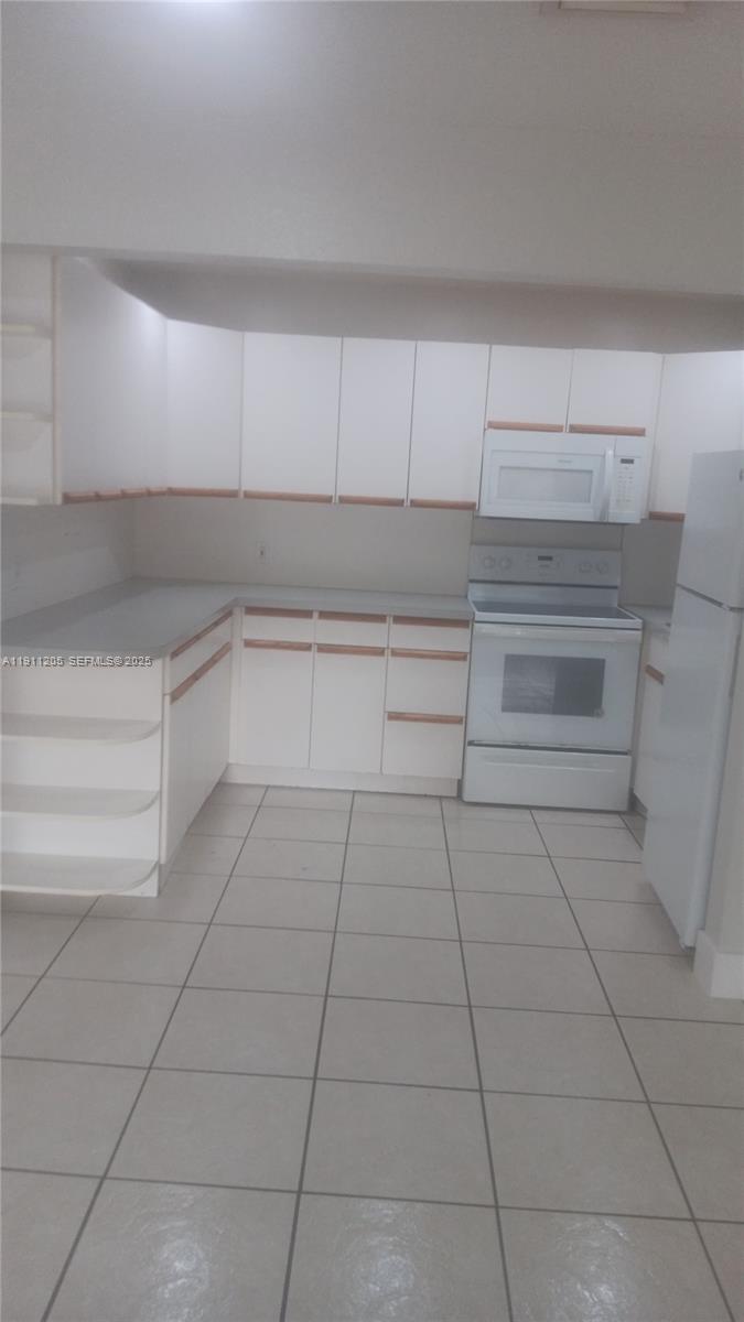 4104 Northwest 88th Avenue, Unit 2 Coral Springs, FL 33065 - Photo 5 of 9