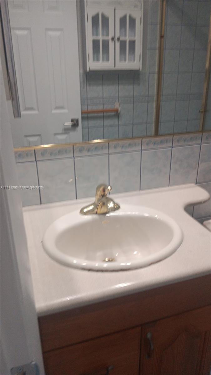 4104 Northwest 88th Avenue, Unit 2 Coral Springs, FL 33065 - Photo 8 of 9 a close view of a sink