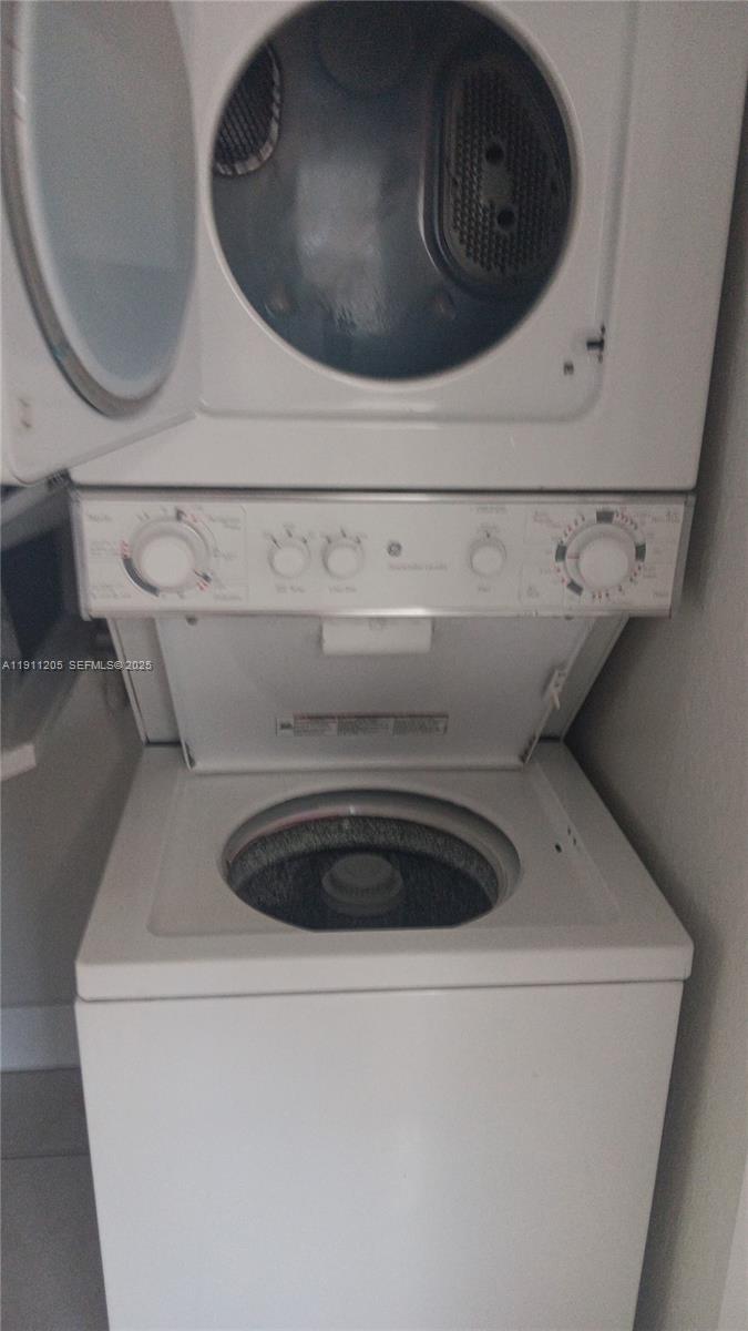 4104 Northwest 88th Avenue, Unit 2 Coral Springs, FL 33065 - Photo 9 of 9 a utility stove sitting inside of a kitchen