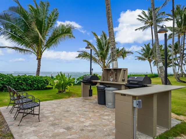 a view of a swimming pool with a yard