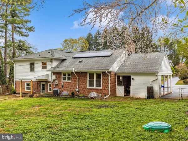 a view of a house with a big yard