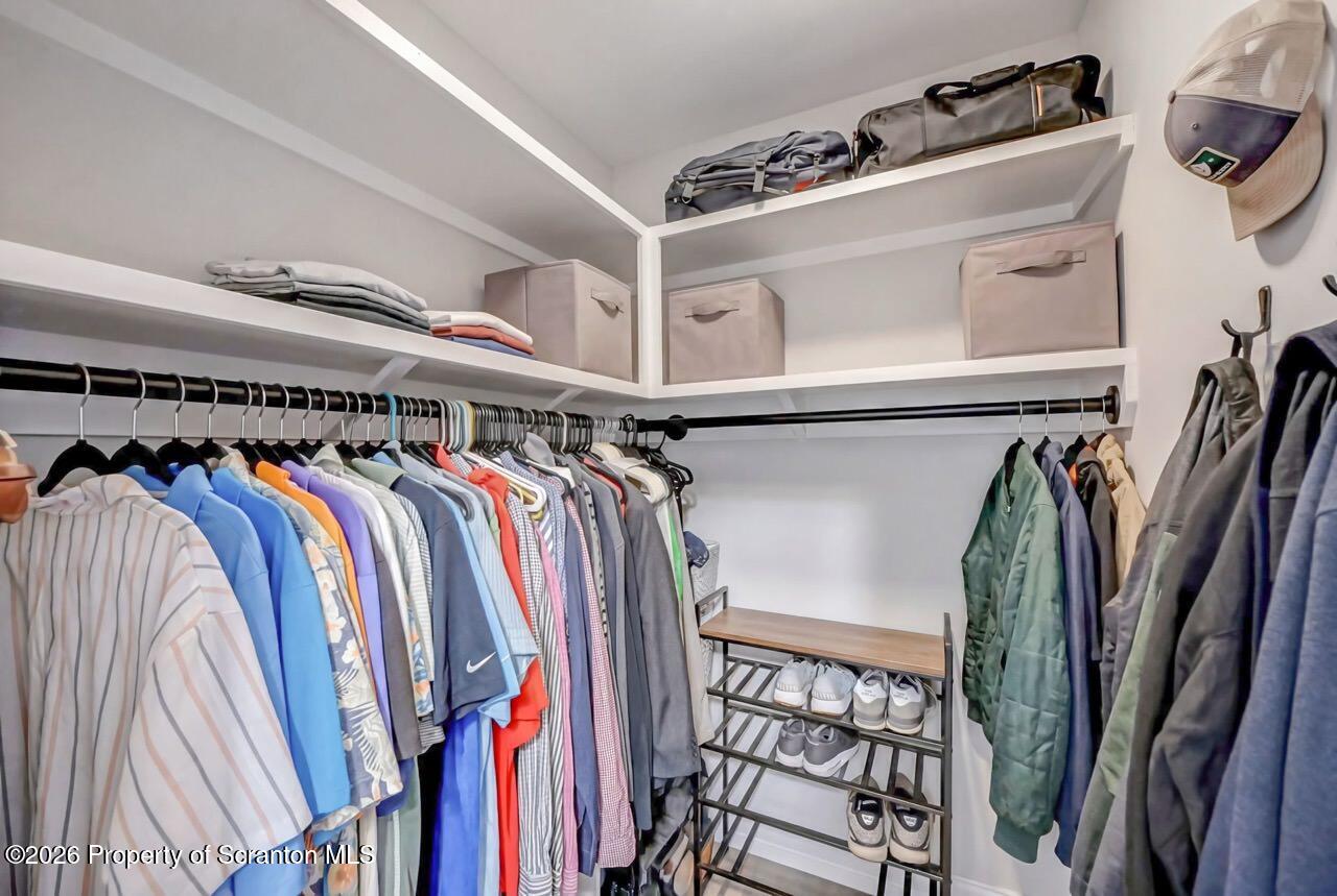 641 East Elm Street Scranton, PA 18505 - Photo 19 of 59 a view of walk in closet with clothes and shoes