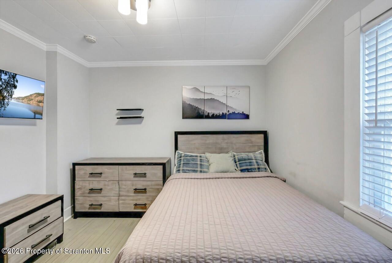 641 East Elm Street Scranton, PA 18505 - Photo 20 of 59 a bedroom with a bed and window