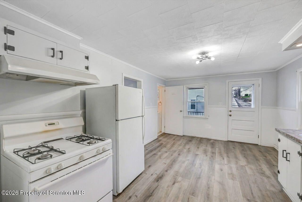 641 East Elm Street Scranton, PA 18505 - Photo 35 of 59 a view of kitchen with furniture and wooden floor