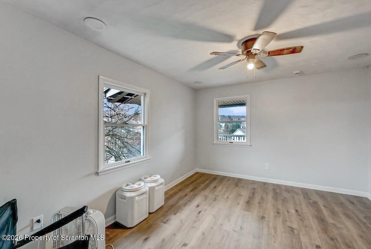 641 East Elm Street Scranton, PA 18505 - Photo 37 of 59 wooden floor in an empty room with a window