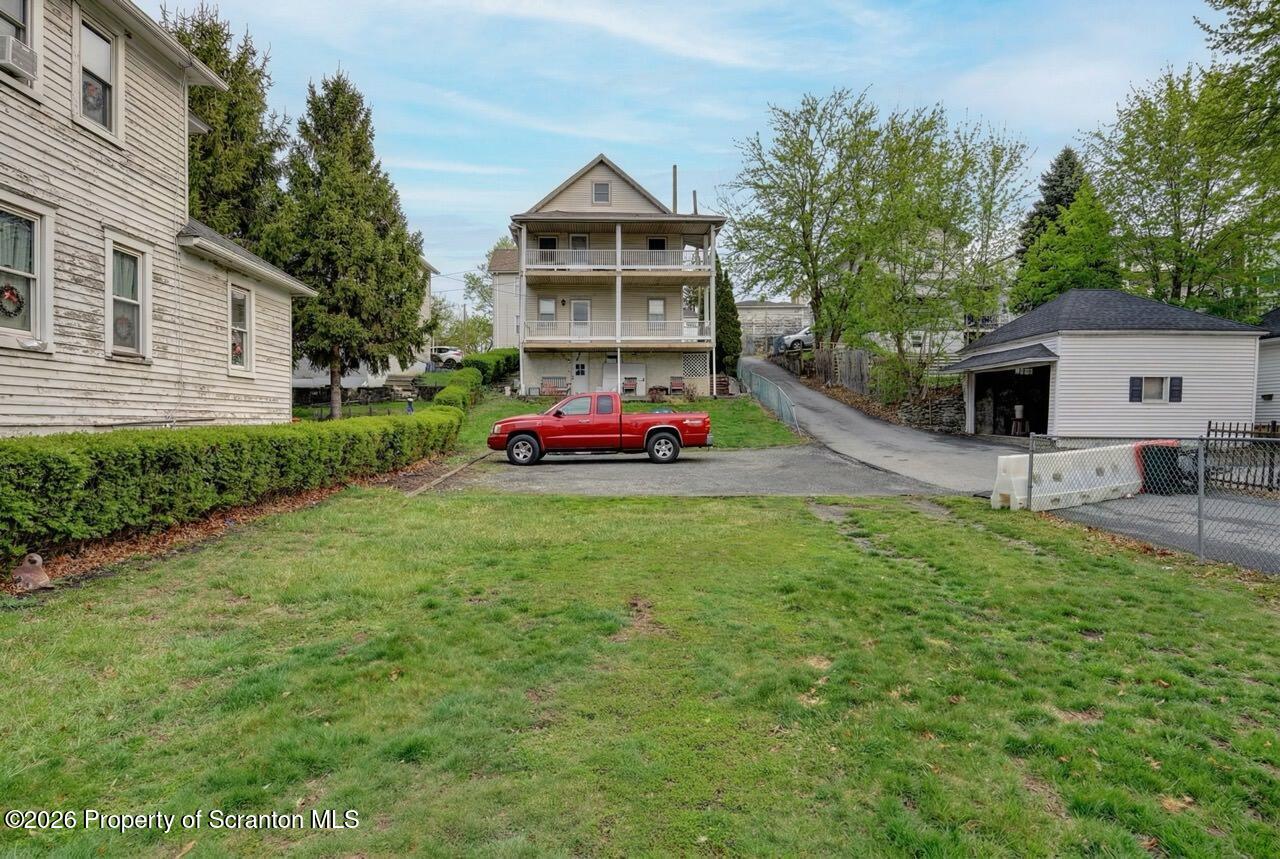 641 East Elm Street Scranton, PA 18505 - Photo 4 of 59 a front view of a house with a yard