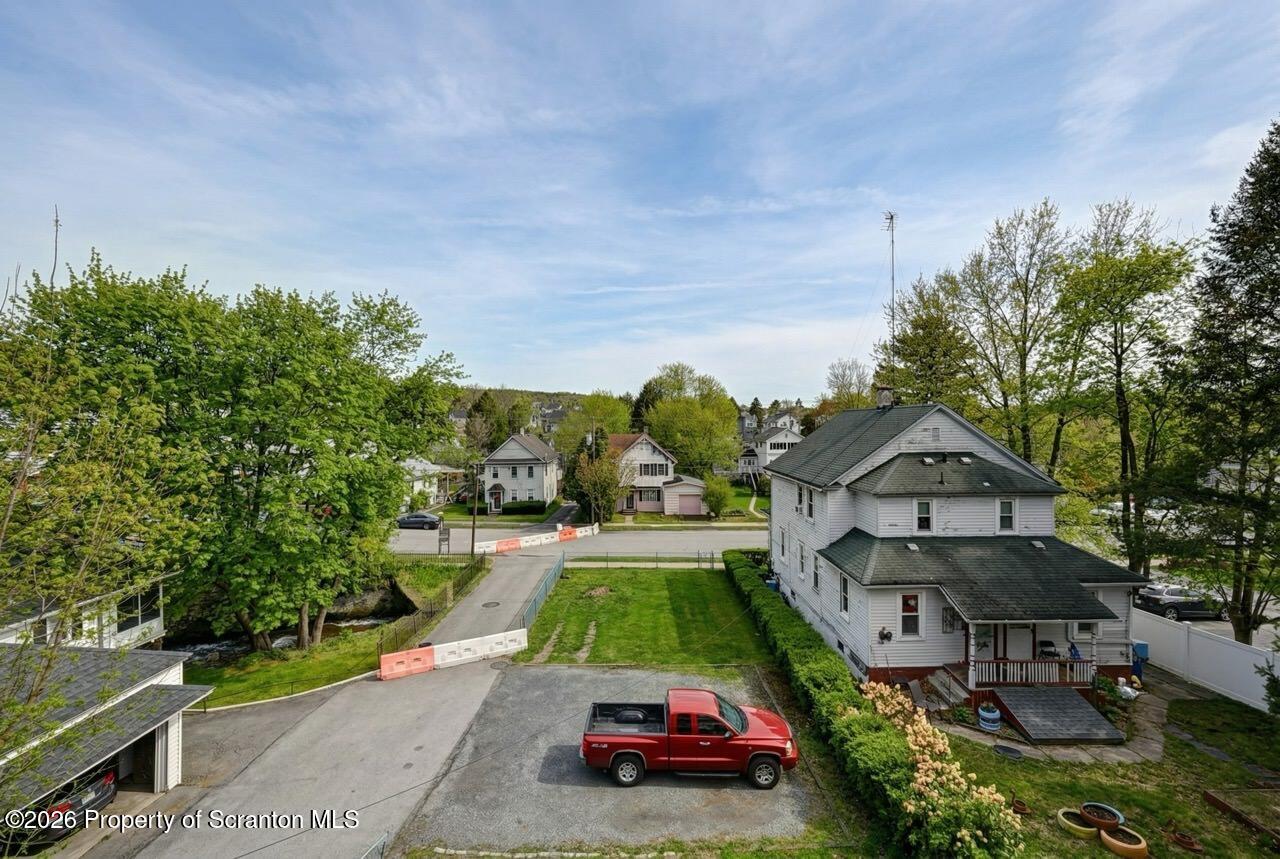 641 East Elm Street Scranton, PA 18505 - Photo 49 of 59 an aerial view of a house with swimming pool garden and patio