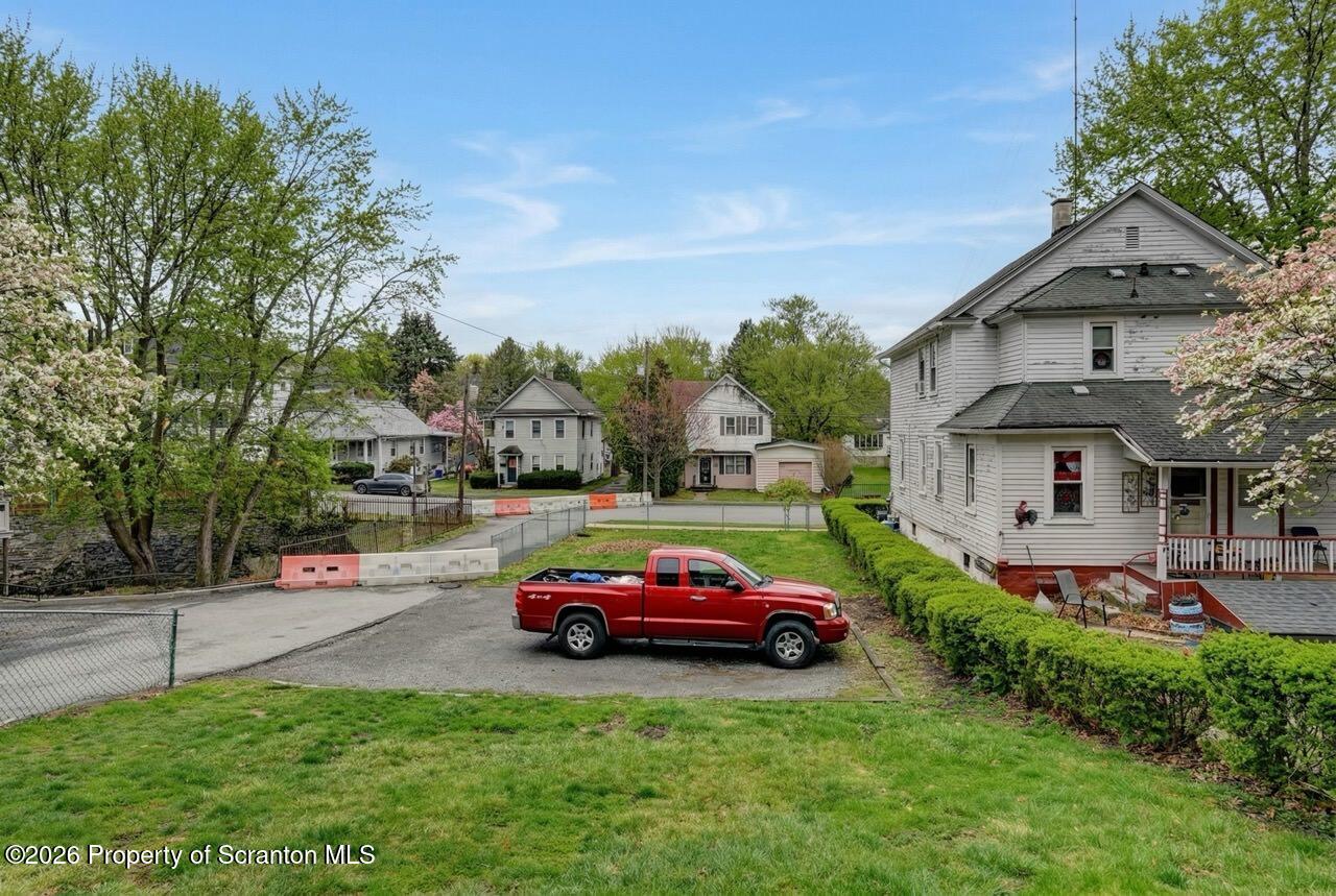 641 East Elm Street Scranton, PA 18505 - Photo 53 of 59 a front view of a house with a garden