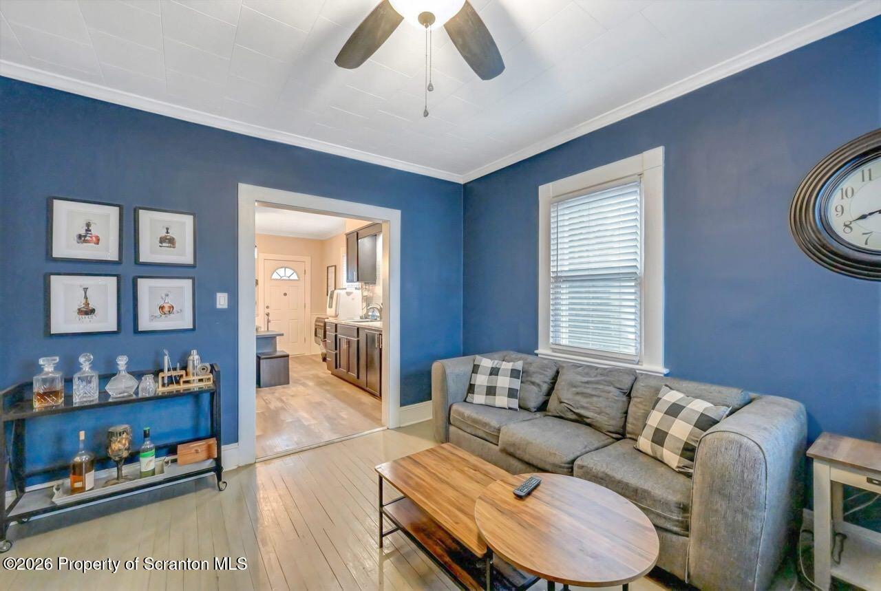 641 East Elm Street Scranton, PA 18505 - Photo 7 of 59 a living room with furniture and a window